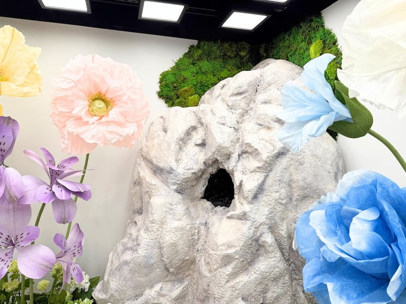 Shop fitting with moss walls