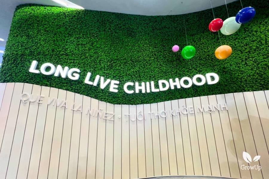 moss wall in childrens hospital with the text 'Long Live Childhood'