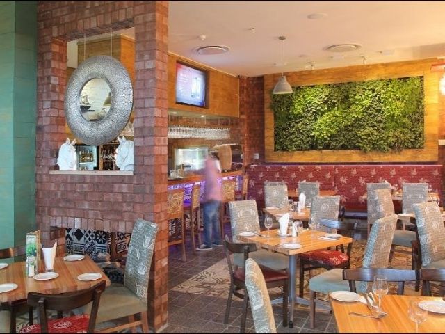 Greenwall in cozy restaurant