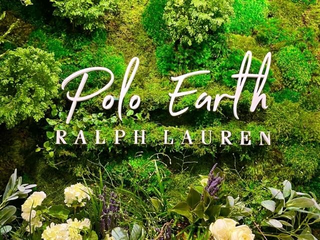 Close of of moss wall with Ralph Lauren signage