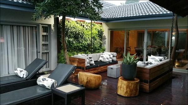 Growup vertical farming | green wall on sundeck by the pool