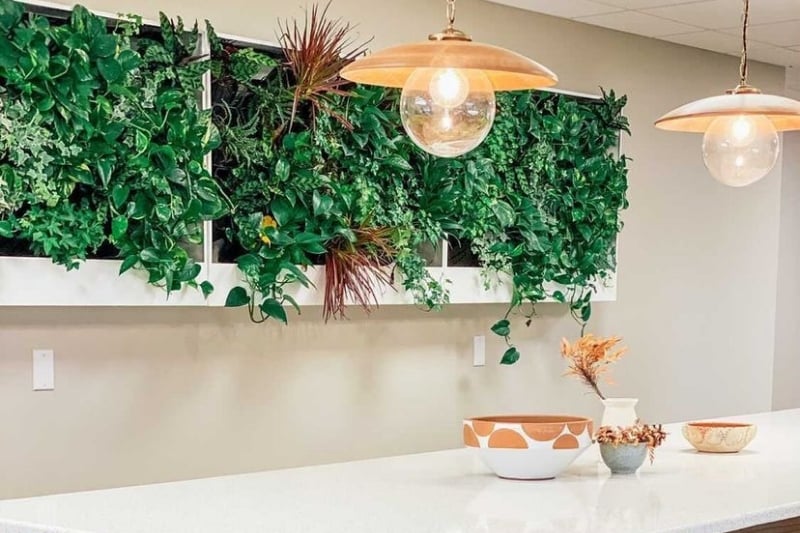 Wall-mounted designer units in a staged kitchen
