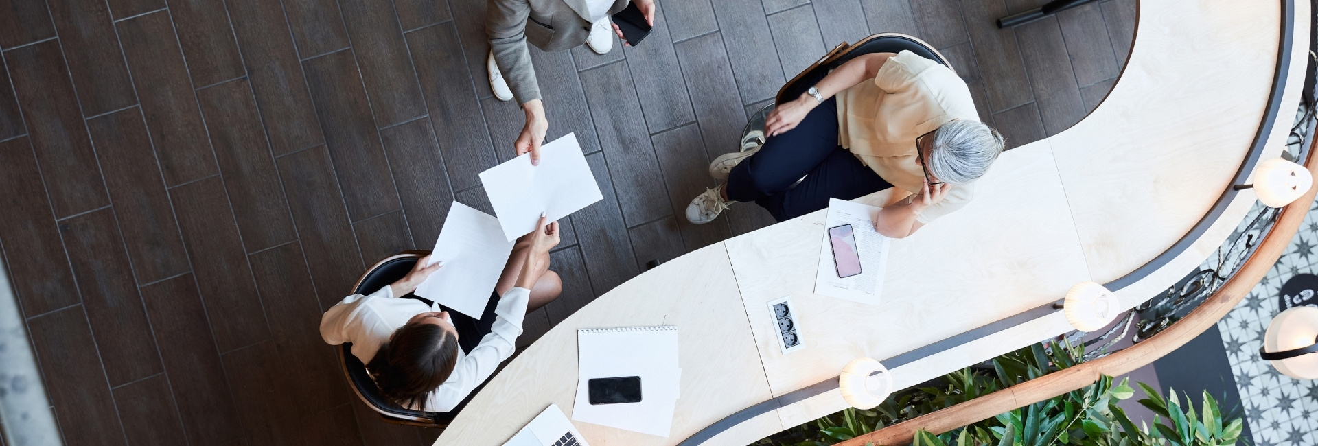 People in an office photographed from above